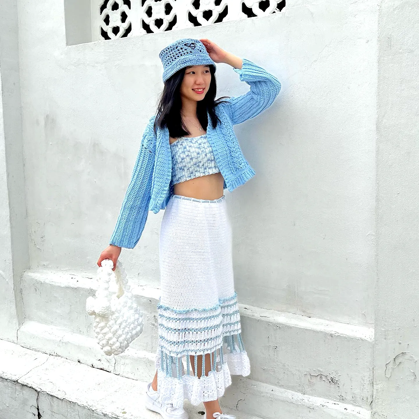 Cute and Comfortable Blue Crochet Skirt with Textured Pattern and Fringe Details