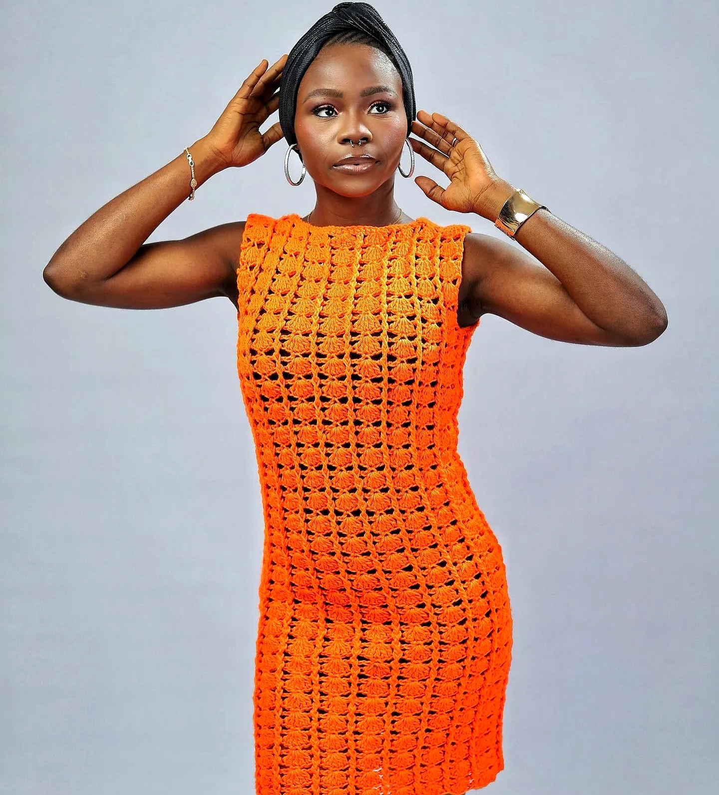 Stylish Orange Crochet Dress in Comfortable Bodycon Design with Intricate Pattern