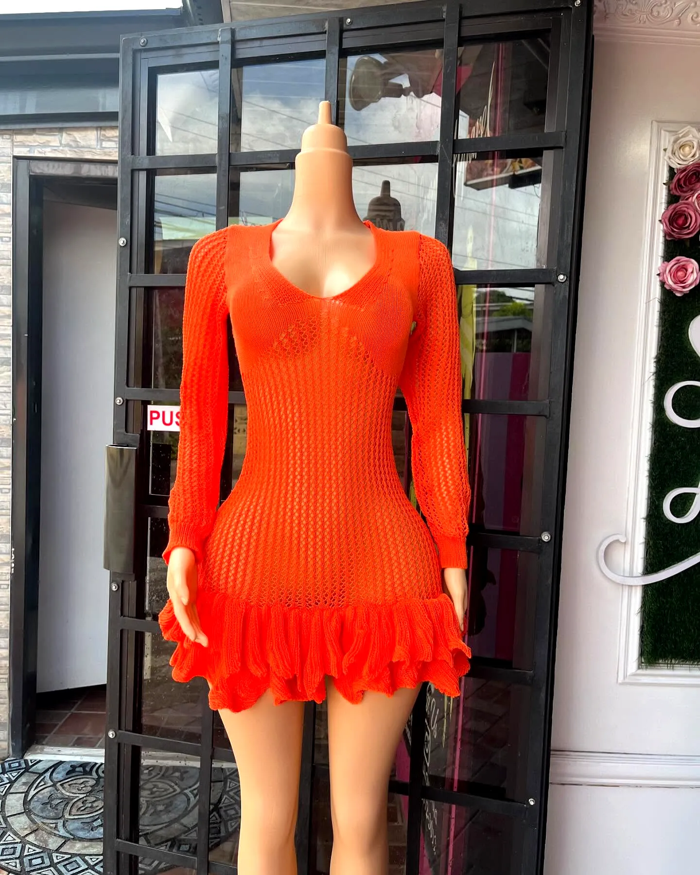 Stylish Orange Crochet Dress with Flared Hem and Deep V-Neckline
