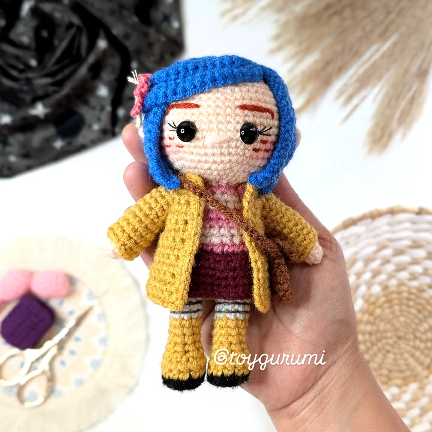 Adorable crochet amigurumi doll in vibrant colors and stylish outfit