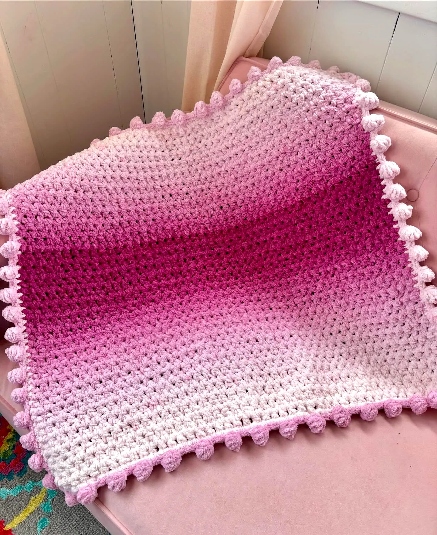 Adorable Crochet Baby Blanket in Pink Ombre with Pom-Pom Edge