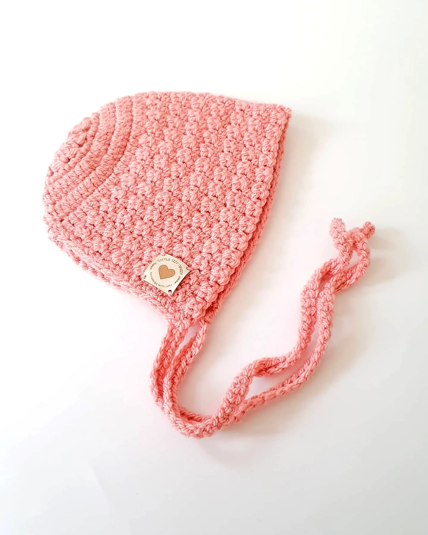 Adorable Crochet Baby Bonnet in Soft Pink with Cozy Ties