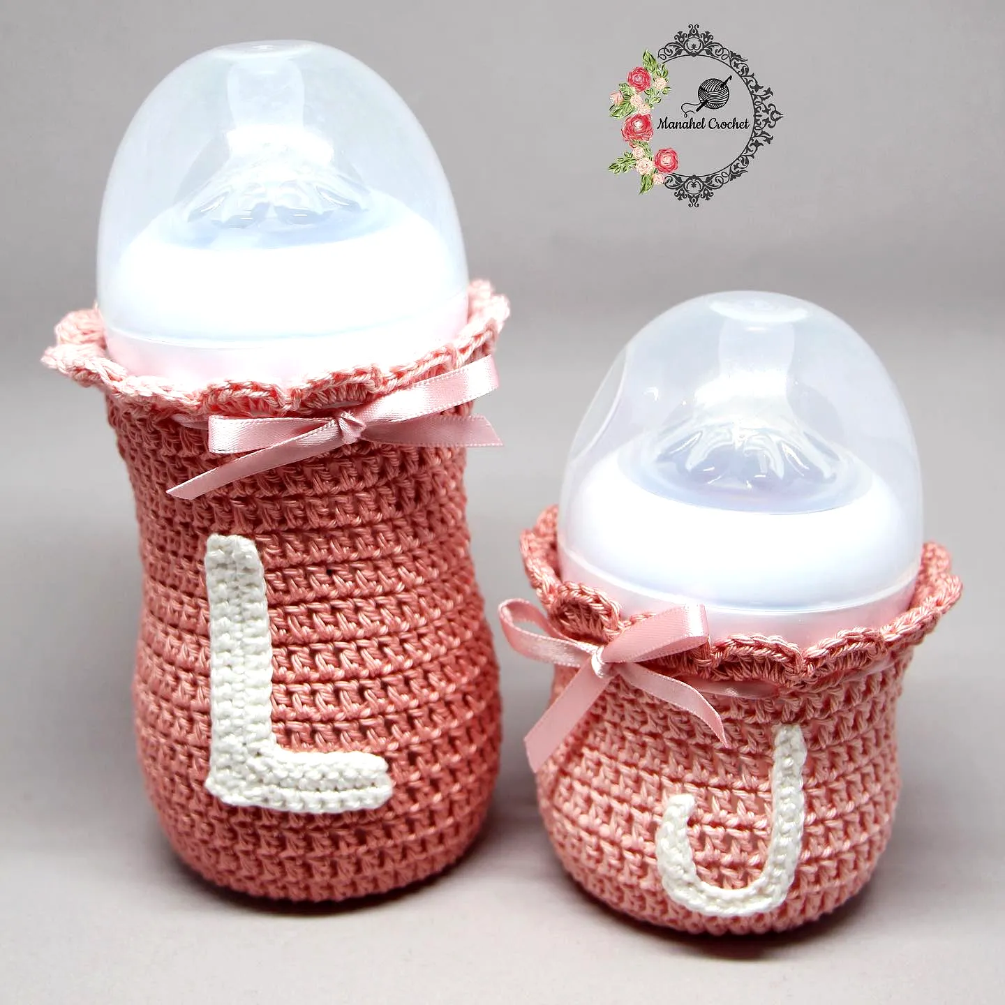 Adorable Crochet Baby Bottle Cover in Soft Pink with Ribbon Accents