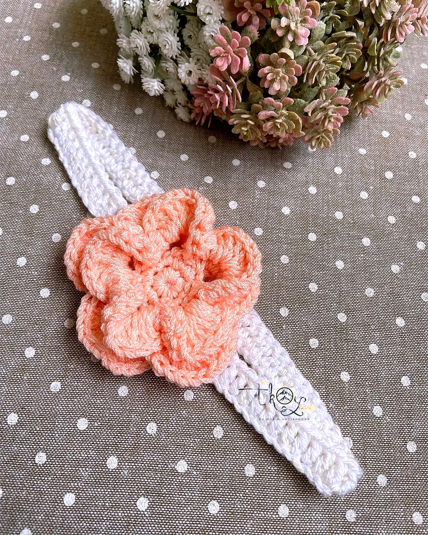 Adorable Crochet Baby Headband in Soft White with Peach Flower