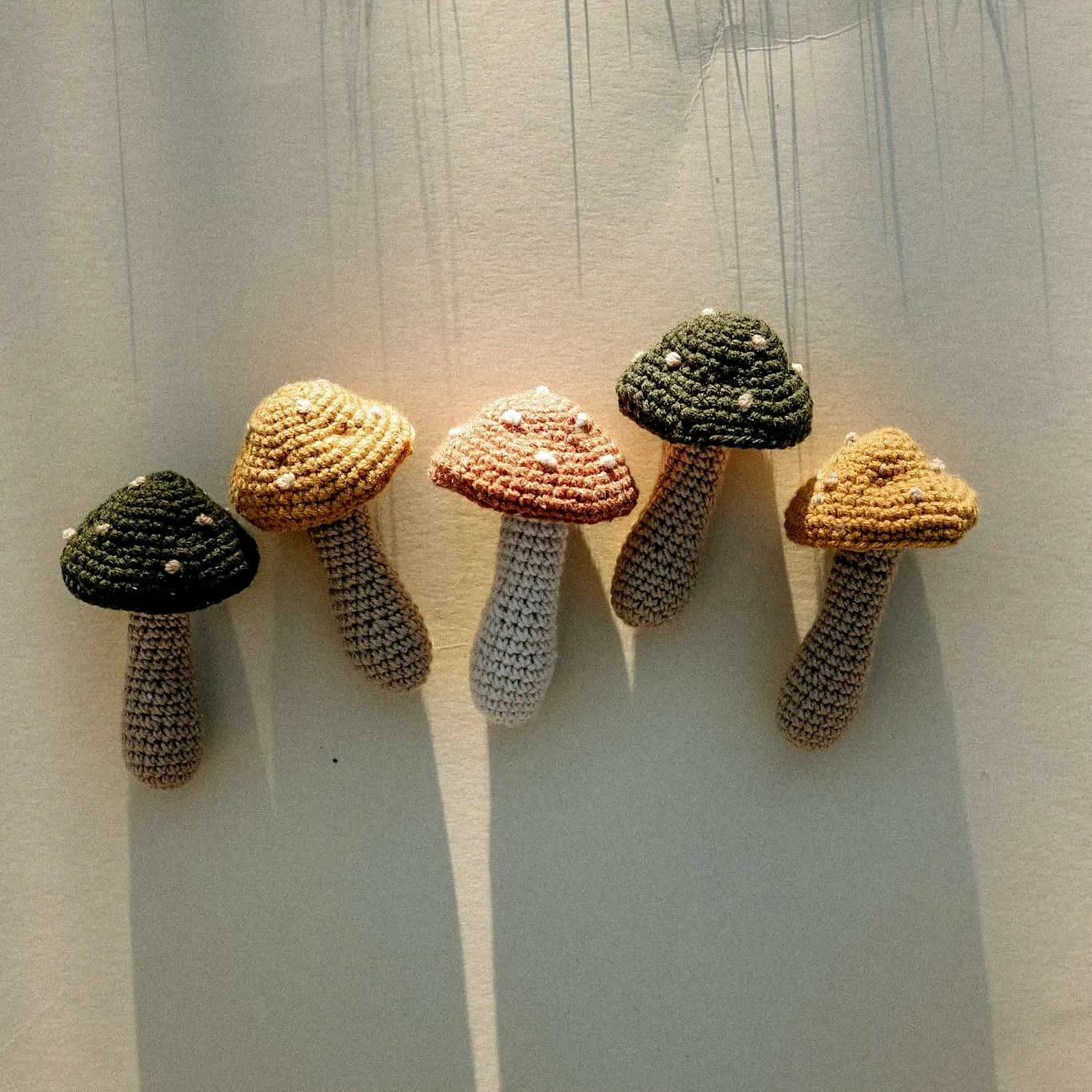 Adorable Crochet Baby Toy in Earthy Tones with Mushroom Design