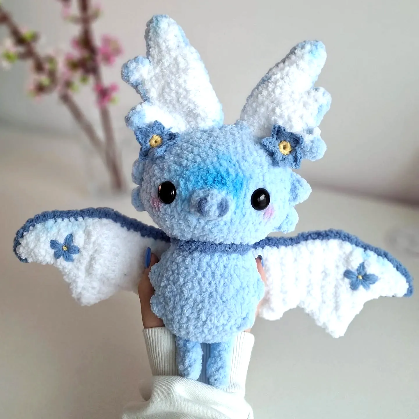 Adorable Crochet Bat in Soft Pastel Blue with Floral Wings