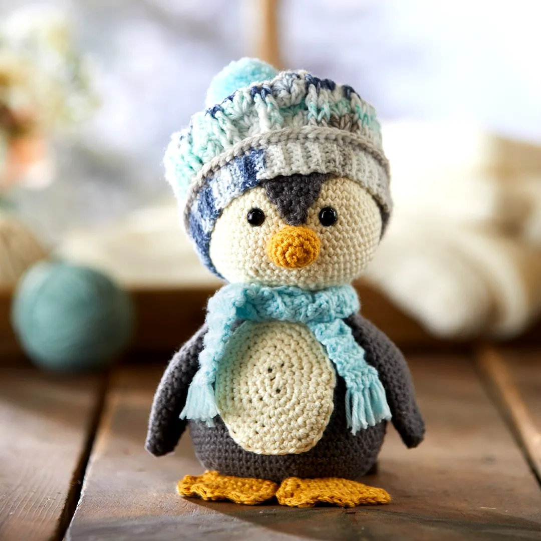 Adorable crochet bird toy penguin in cozy colors for all skill levels