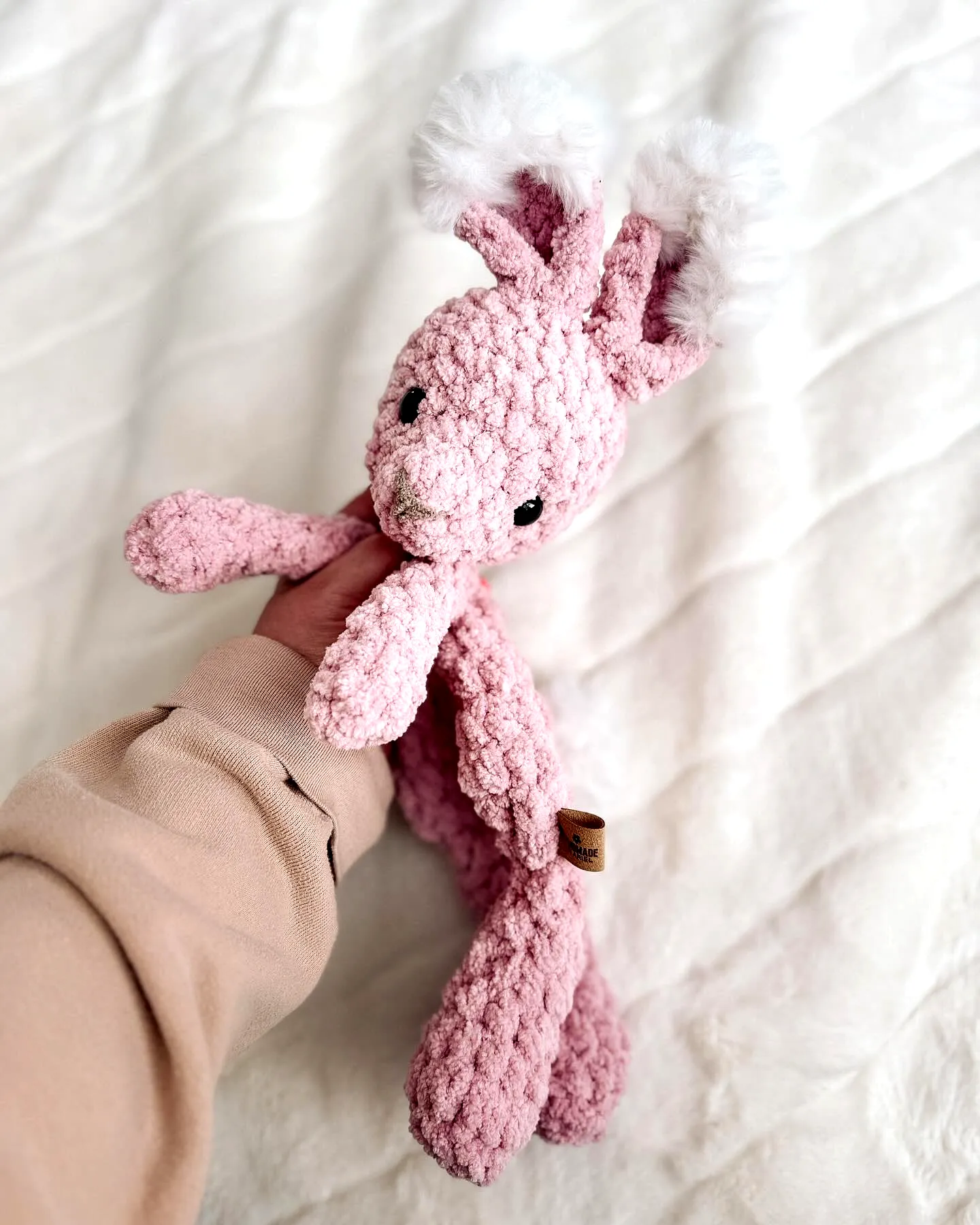 Adorable Crochet Bunny in Soft Pink Yarn with Floppy Ears