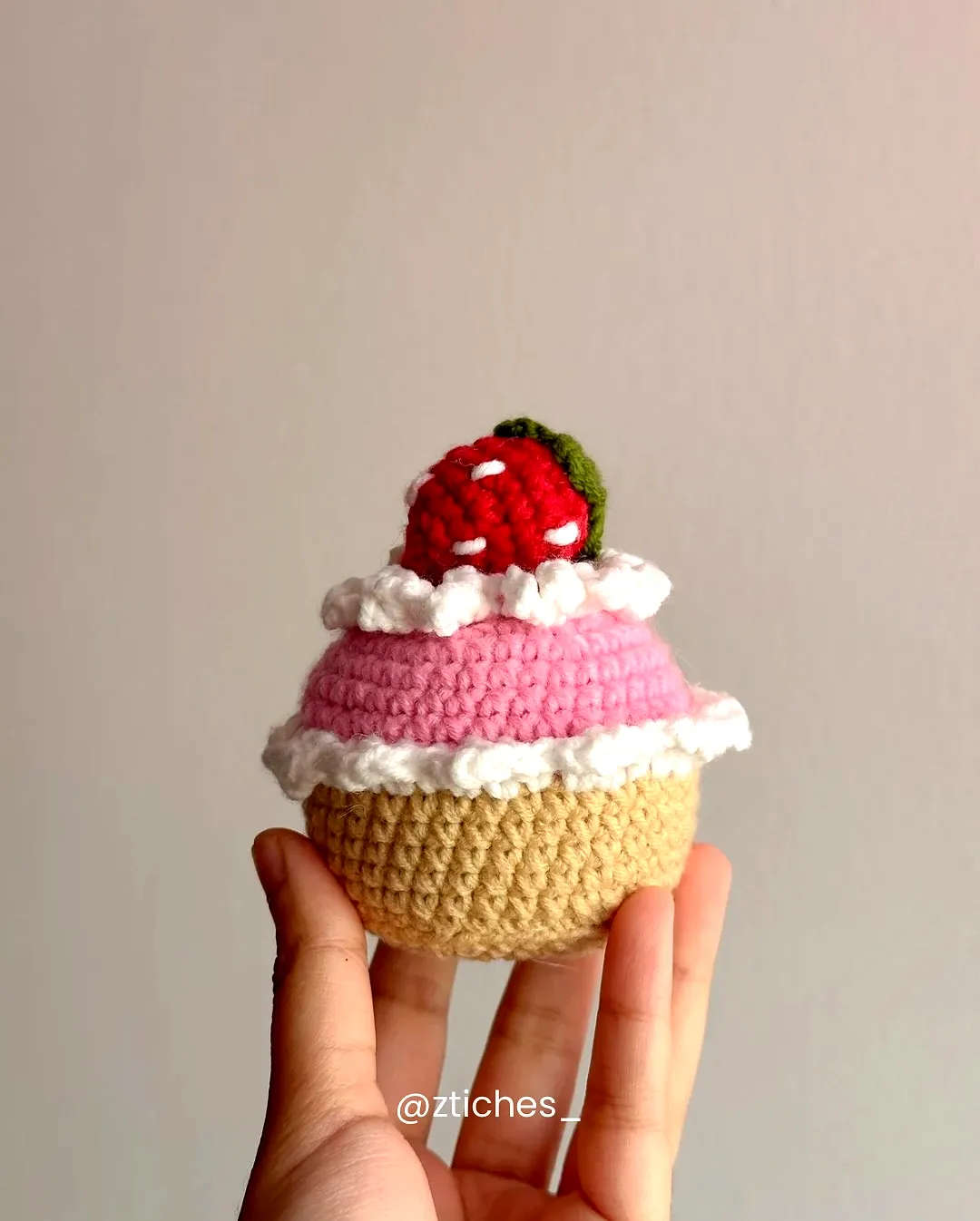 Adorable crochet cupcake with vibrant colors