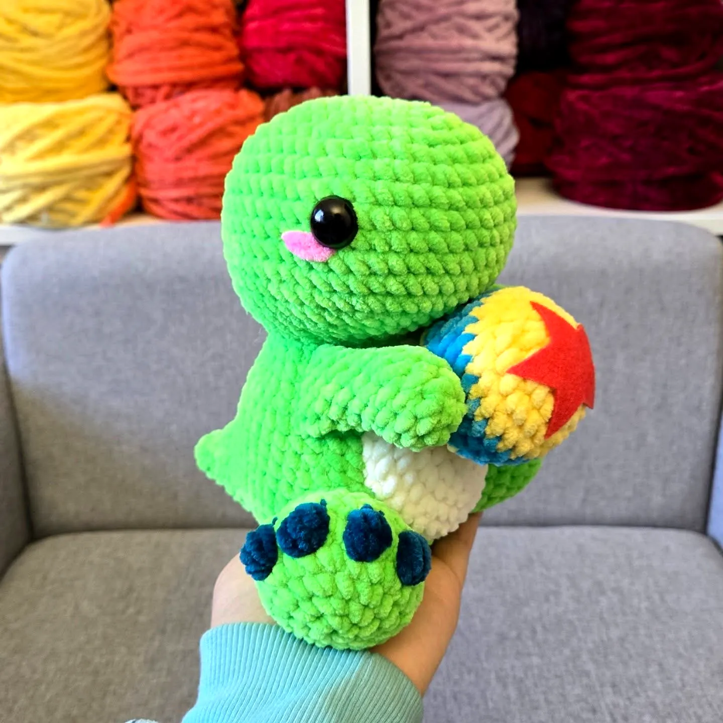 Adorable Crochet Dinosaur in Vibrant Green and Blue Style