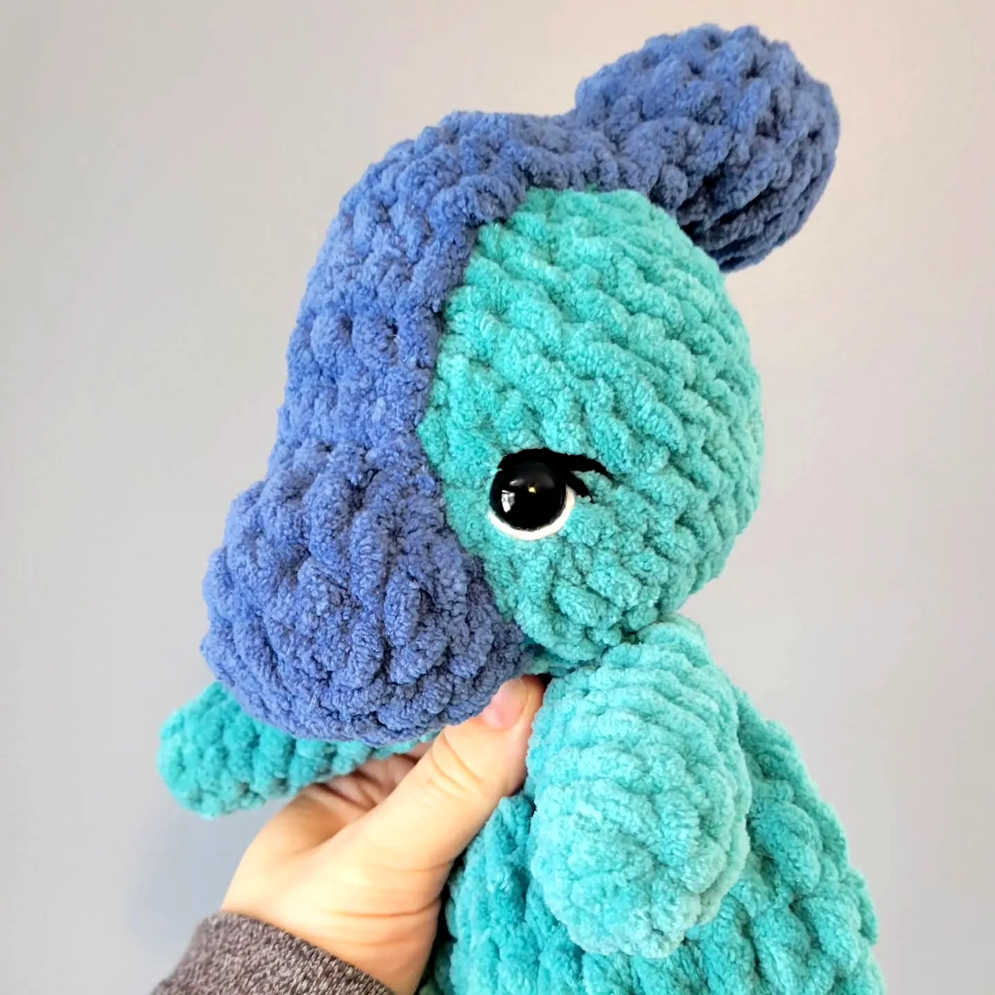 Adorable Crochet Dinosaur Plush in Soft Teal and Blue