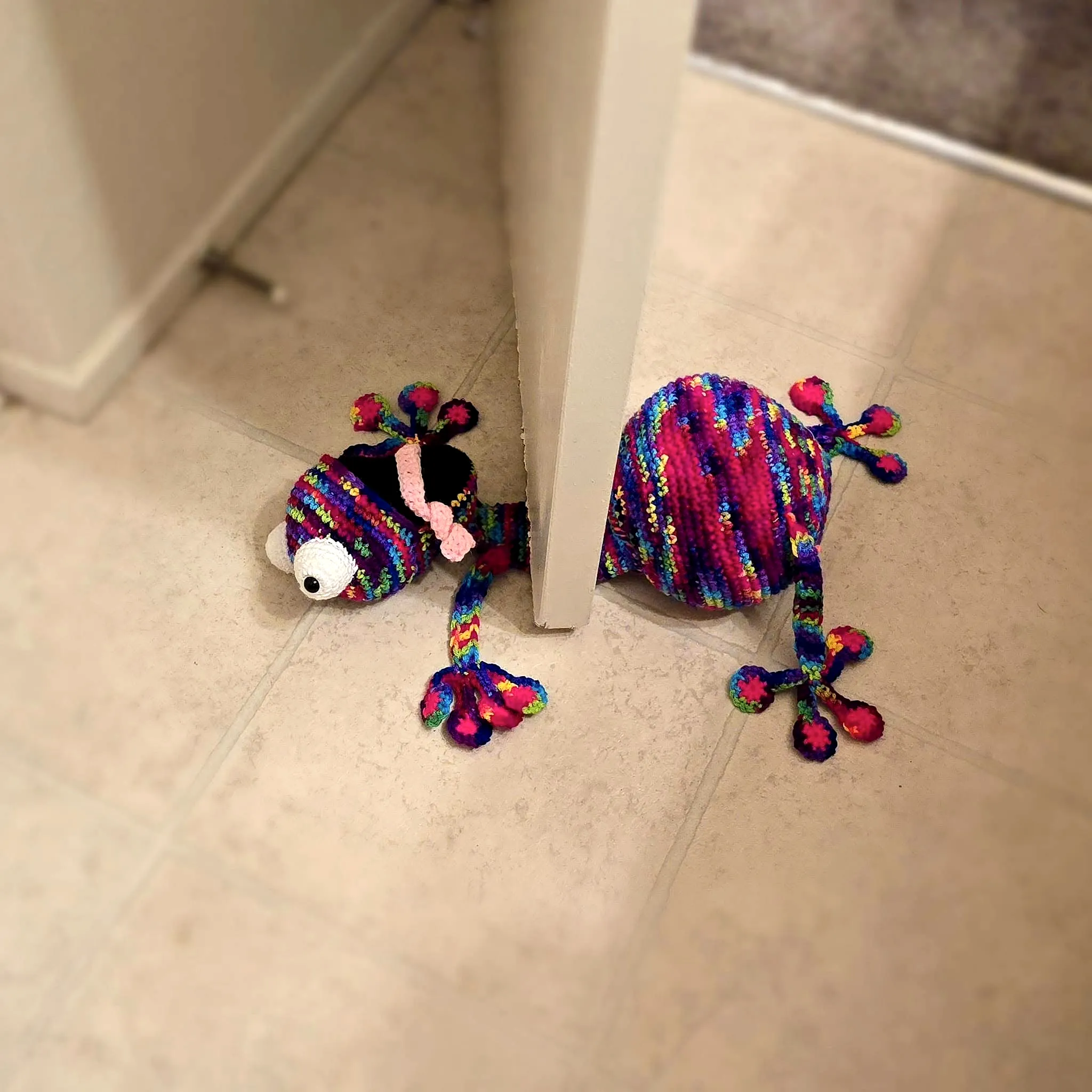 Adorable Crochet Doorstop in Vibrant Animal Style