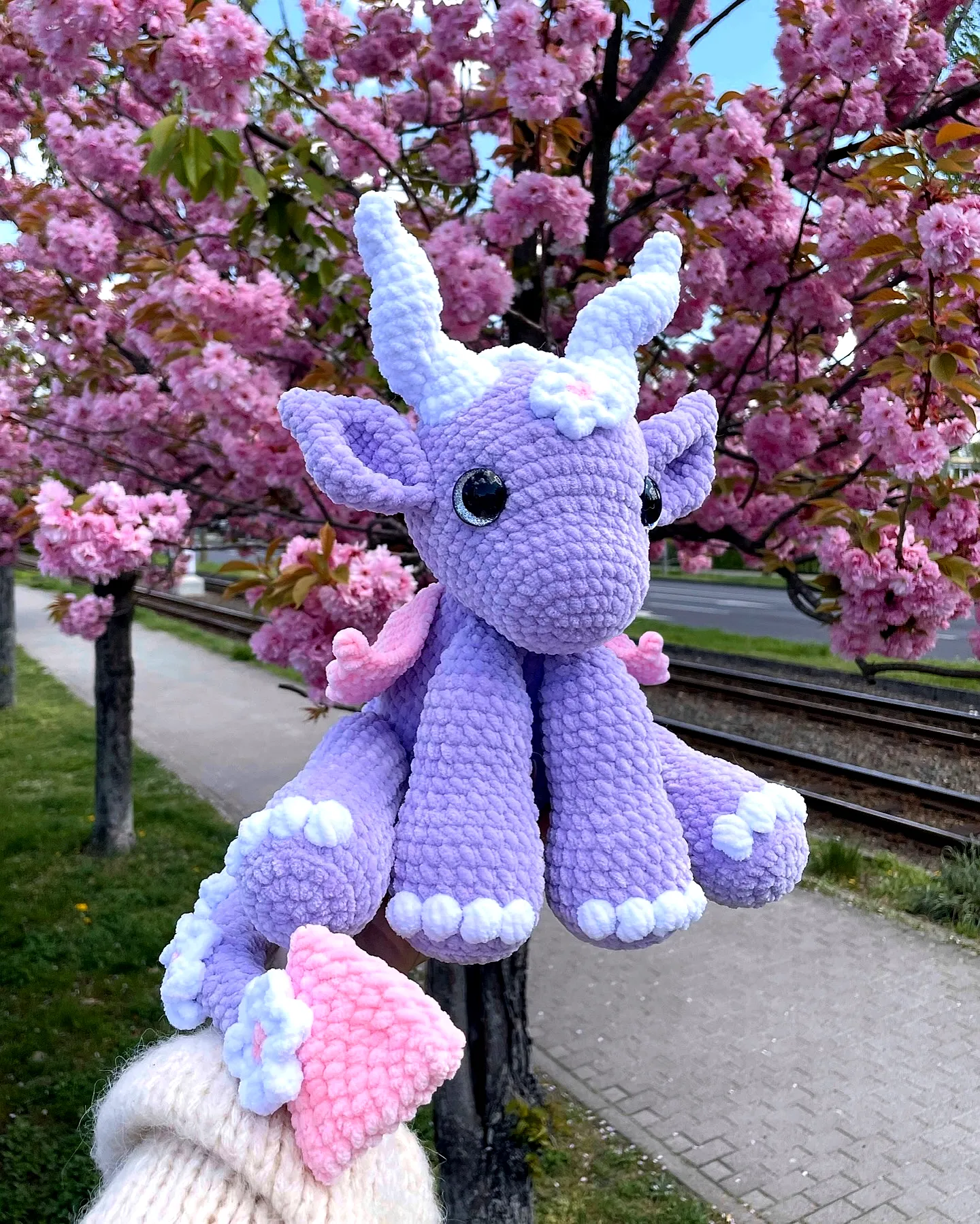 Adorable crochet dragon in pastel lavender with cute wings
