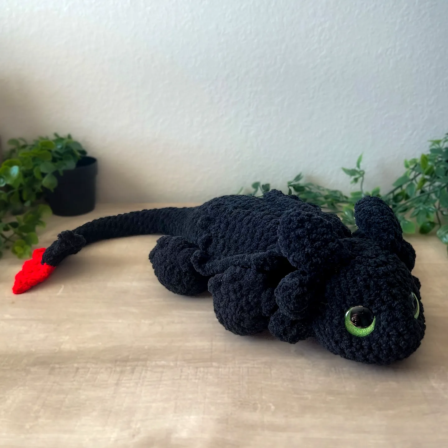 Adorable Crochet Dragon in Soft Black Yarn with Green Eyes