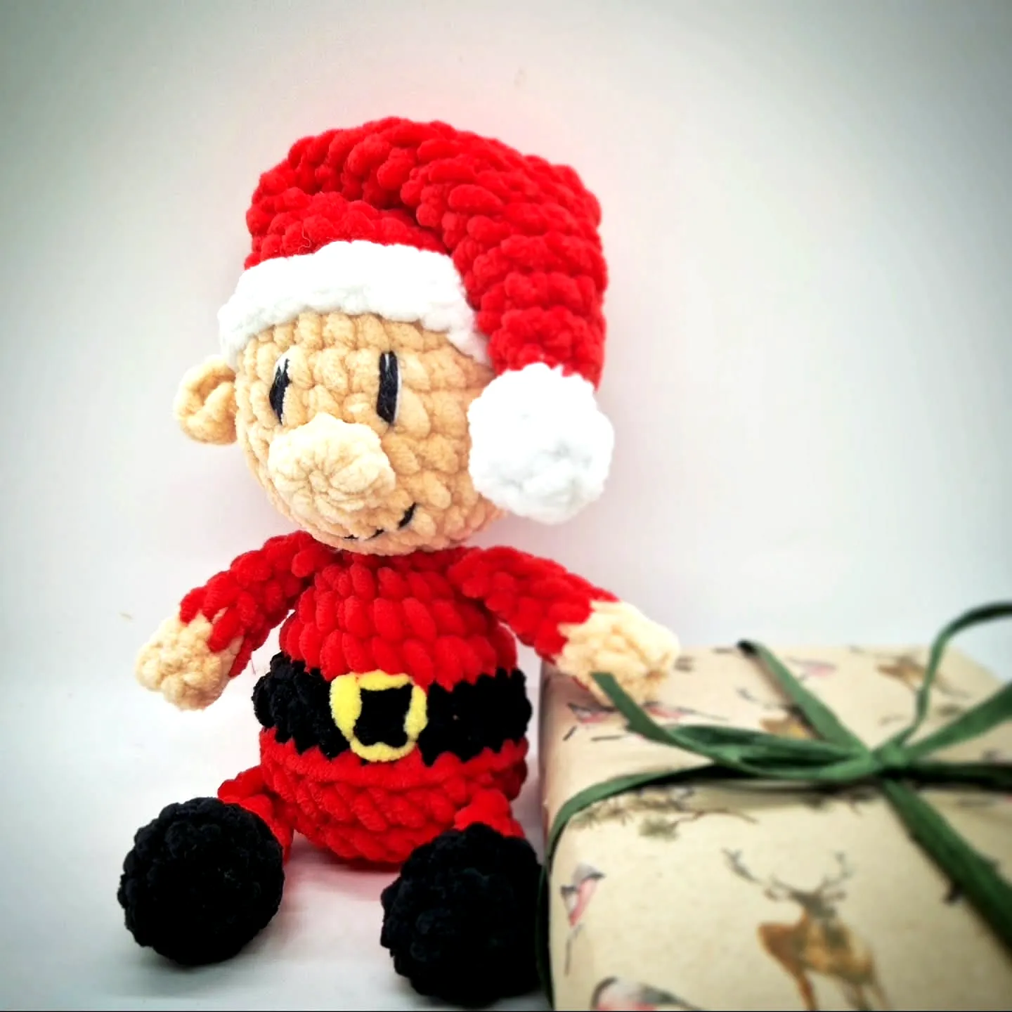 Adorable Crochet Elf in Vibrant Red and Cream Colors