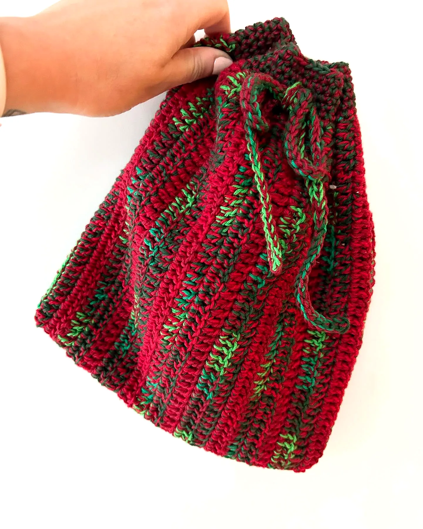 Adorable crochet gift bag in vibrant red and green stripes