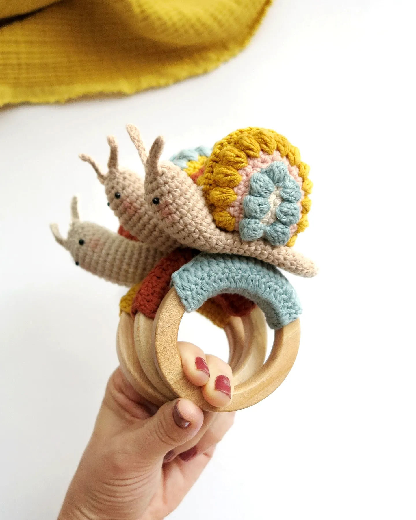 Adorable Crochet Rattle in Colorful Snail Design for Kids