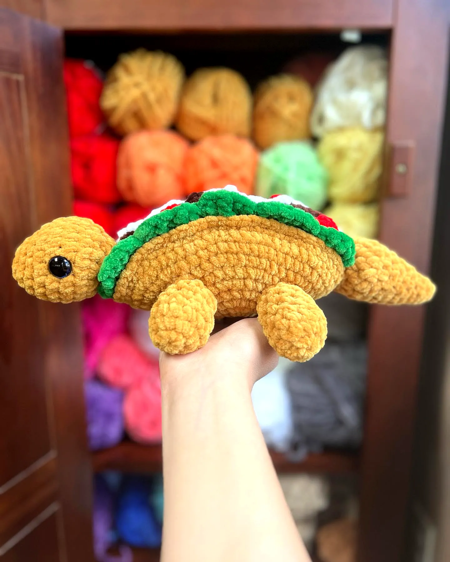 Adorable crochet taco in vibrant colors