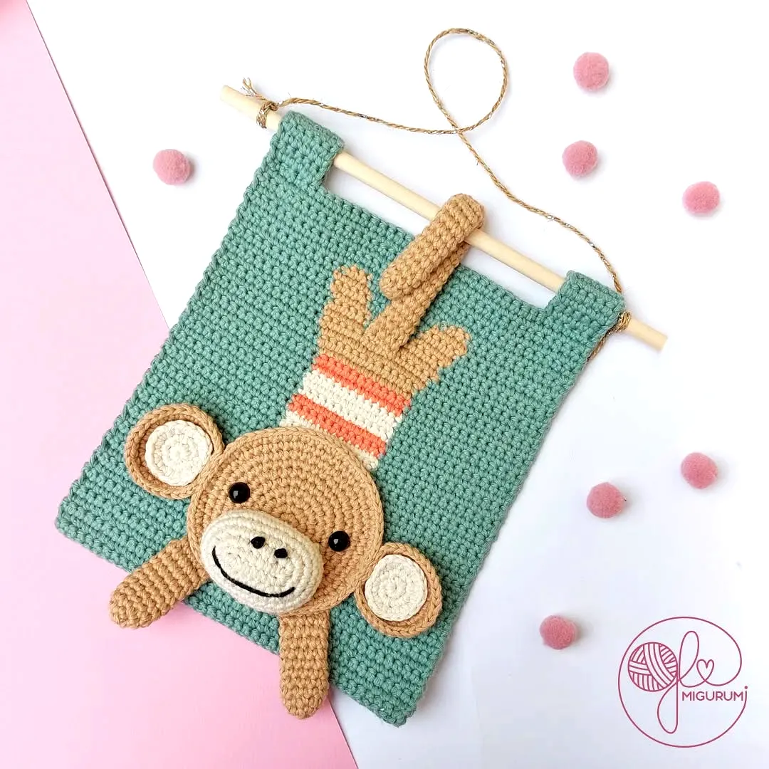 Adorable Crochet Wall Decor with Playful Monkey Design