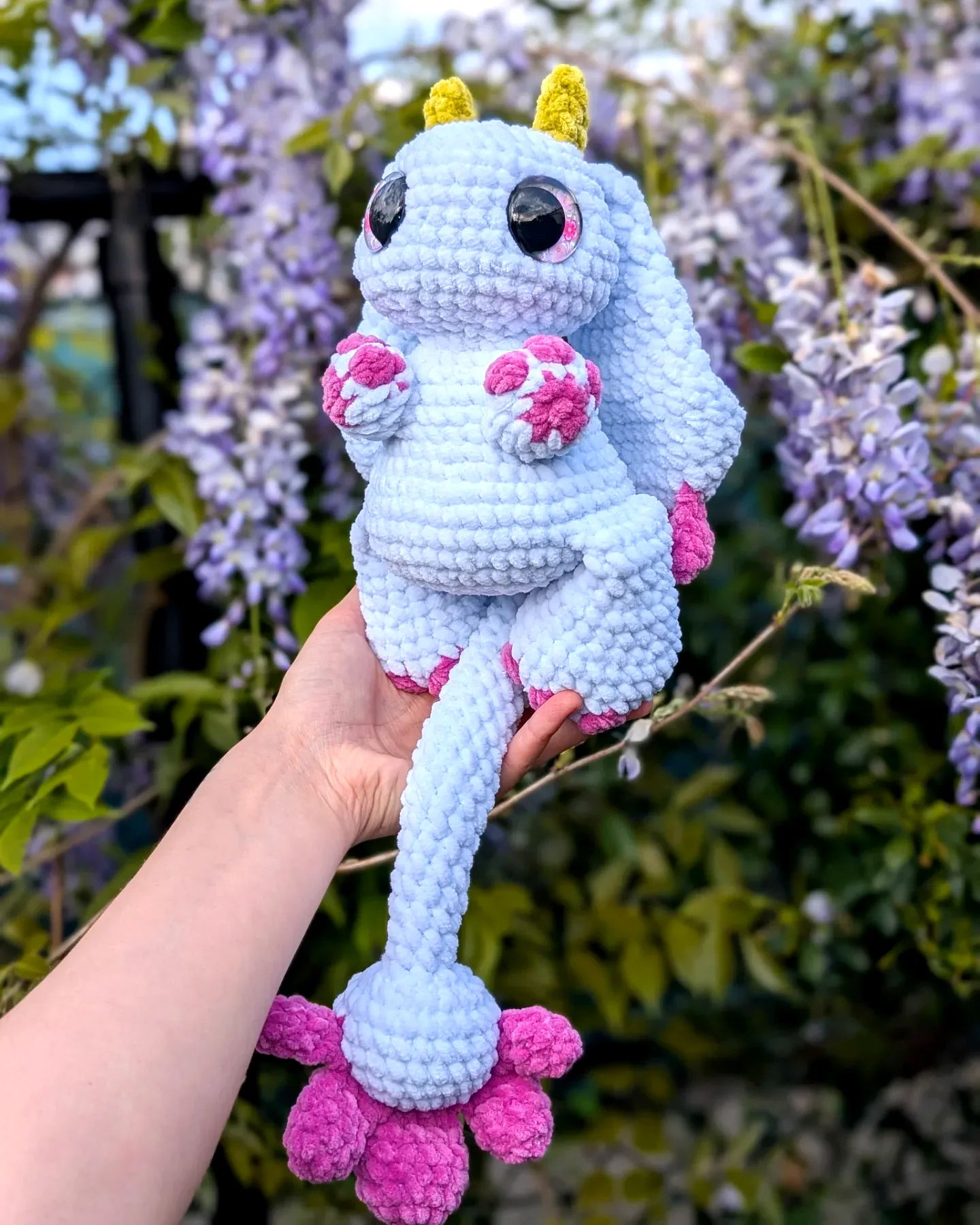 Adorable pastel blue crochet amigurumi dragon for intermediates