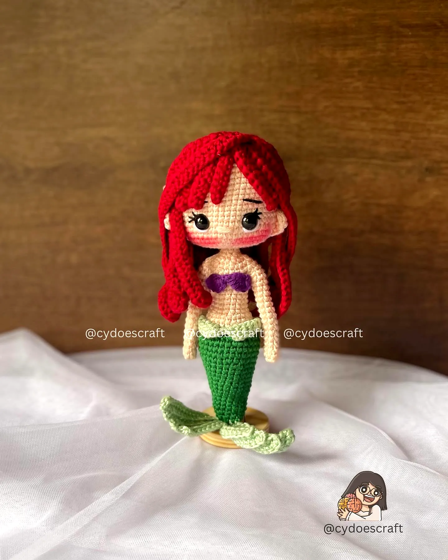 Charming colorful crochet doll mermaid with vibrant details