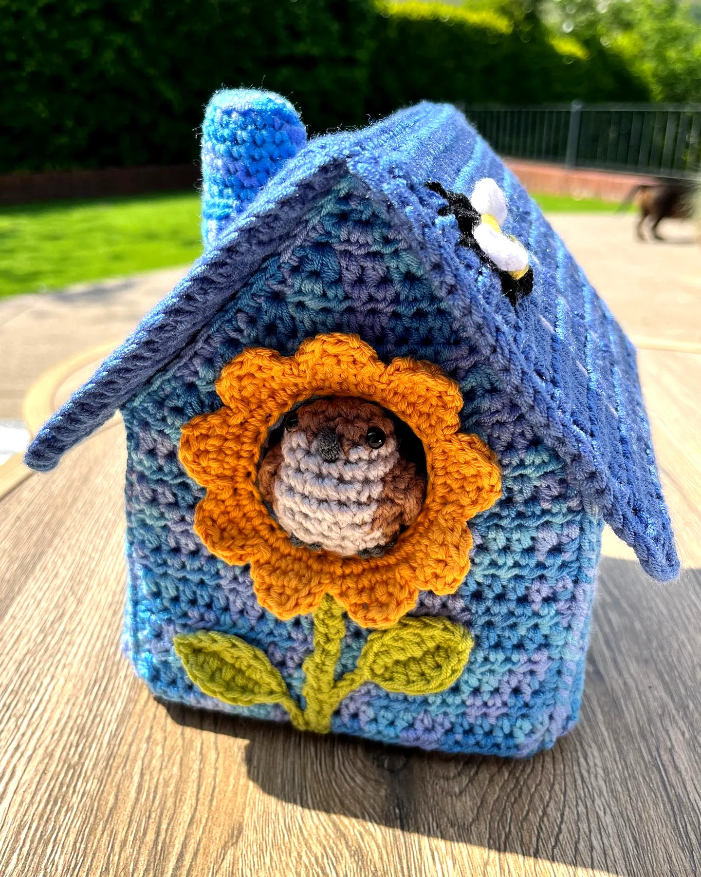Charming Crochet Birdhouse in Vibrant Blue with Sunflower Detail
