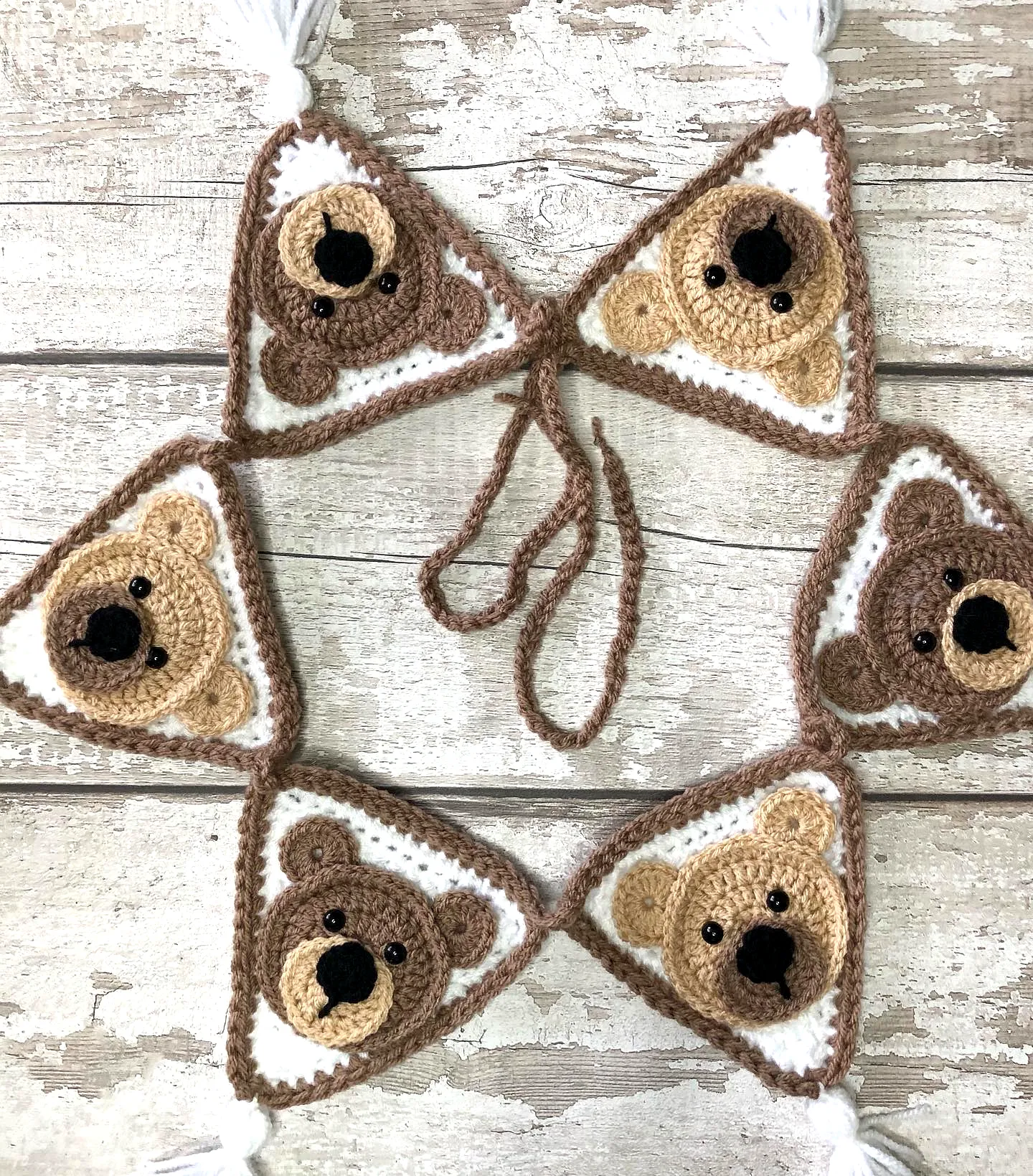 Charming Crochet Bunting with Playful Bear Design in Neutral Tones