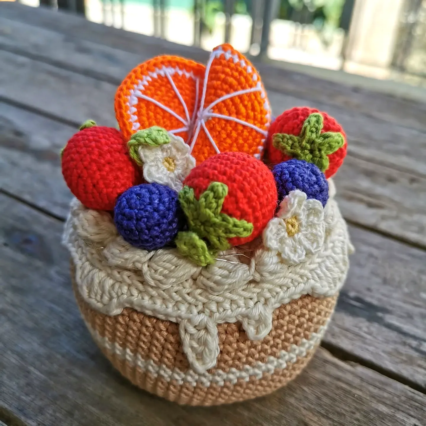 Charming Crochet Cake in Soft Pastels and Vibrant Fruits