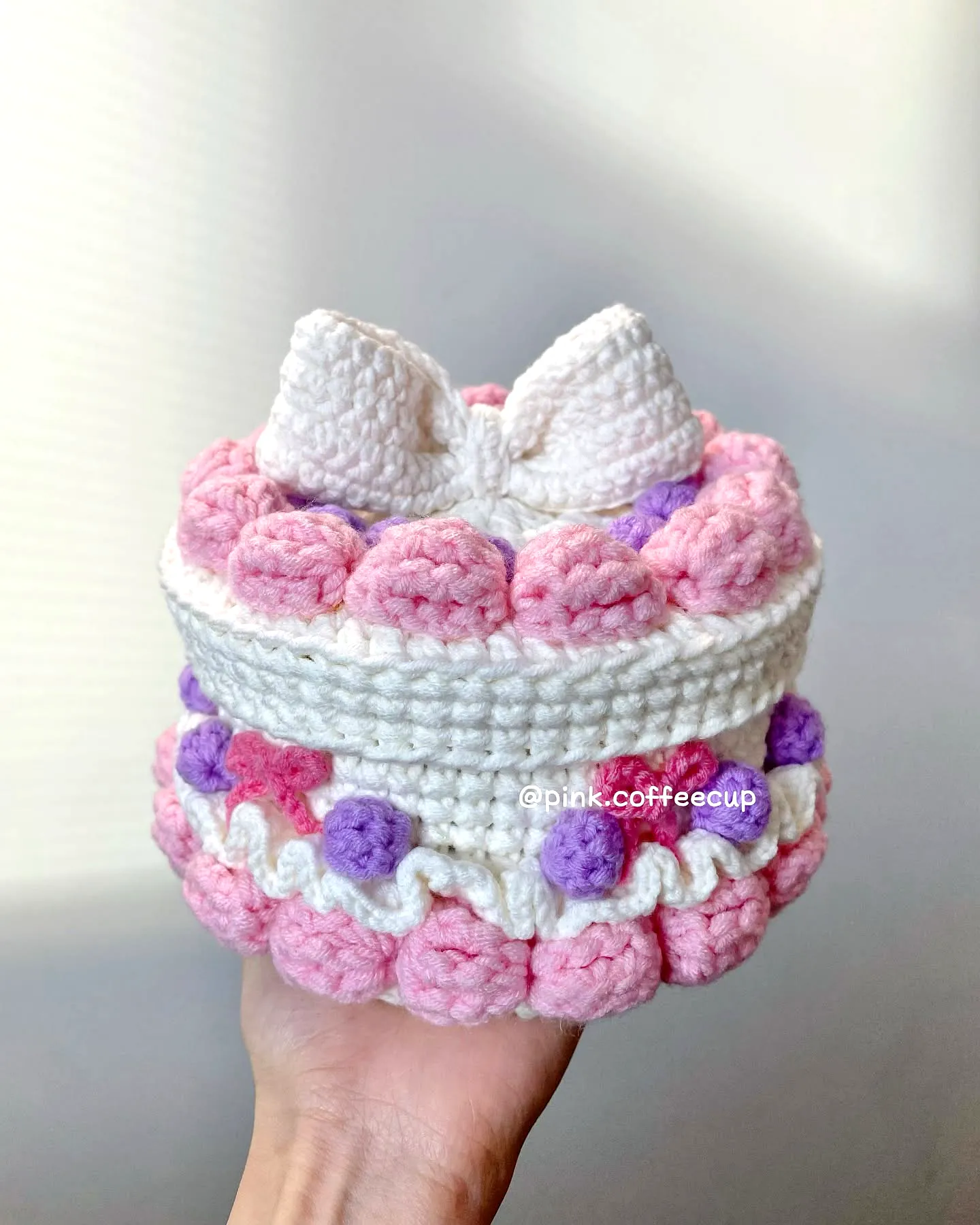 Charming Crochet Cake in Soft Pastels with Textured Details