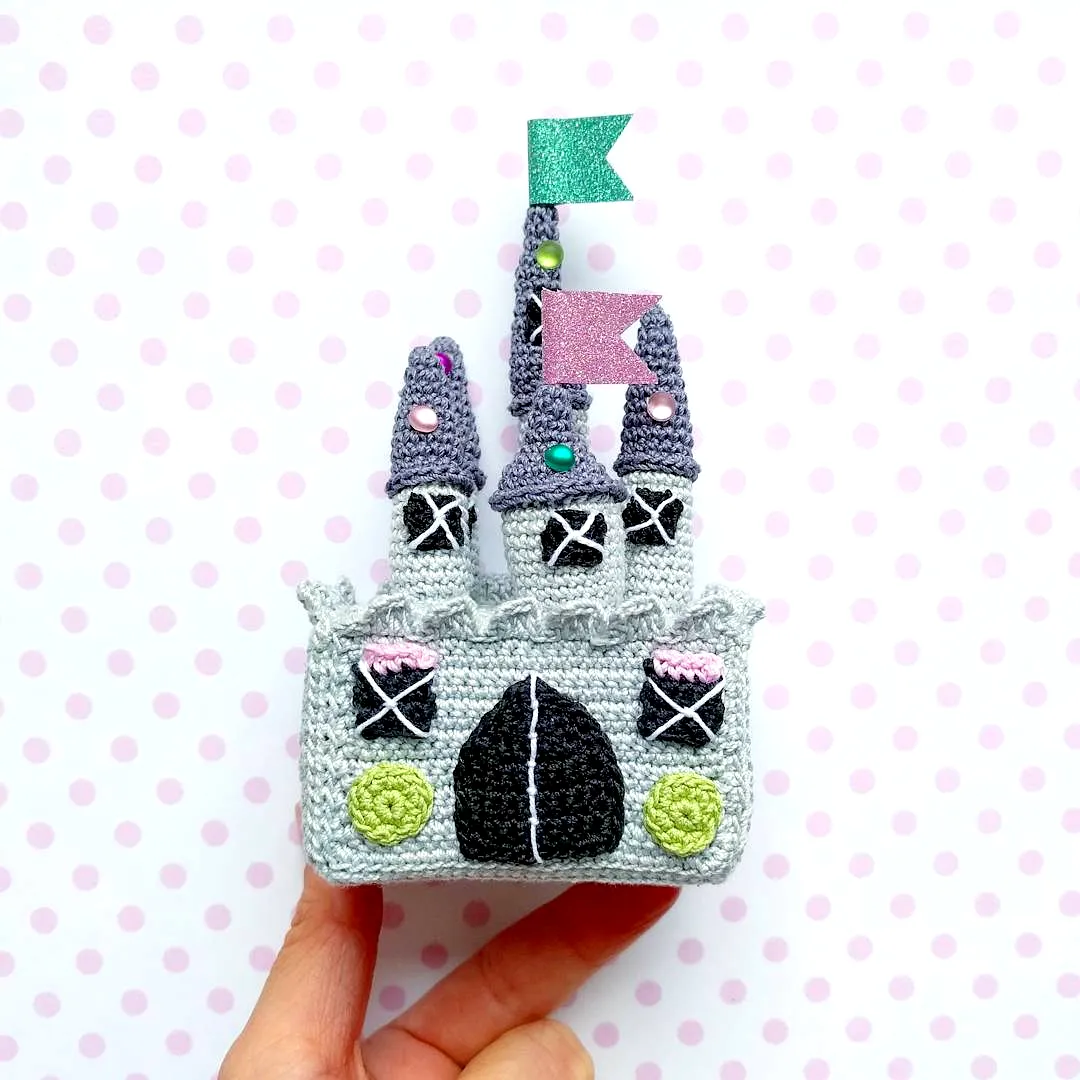 Charming Crochet Castle in Soft Gray with Colorful Accents