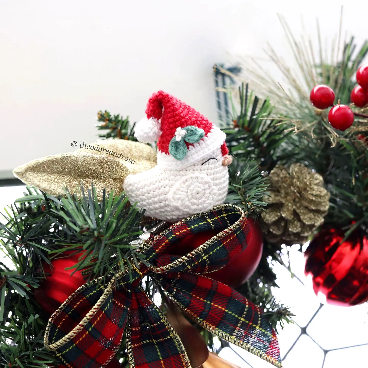 Charming Crochet Christmas Ornament of a Bird in Santa Hat