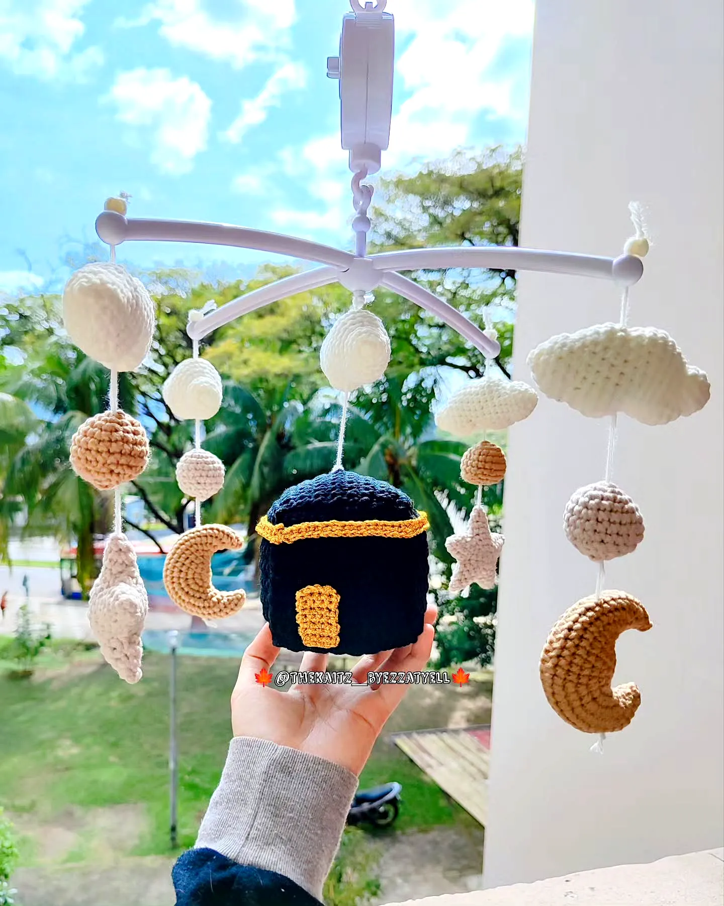 Charming Crochet Crib Mobile in Soft Neutrals with Cute Shapes