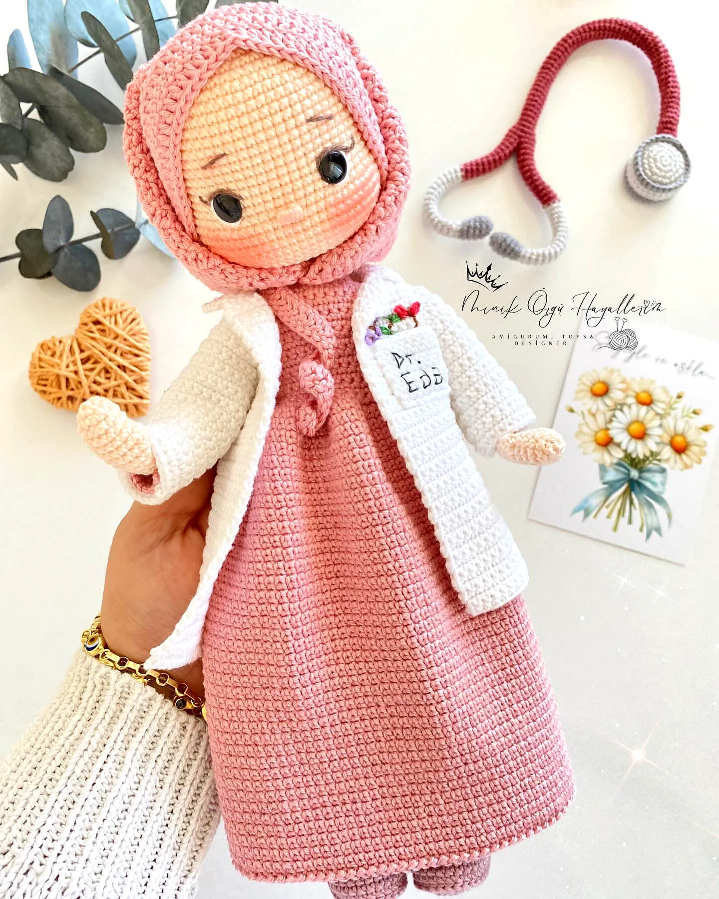 Charming Crochet Doll in Pink Dress and White Coat Design