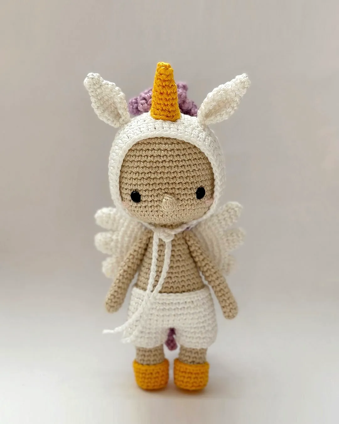 Charming Crochet Doll Unicorn in Cream with Colorful Accents
