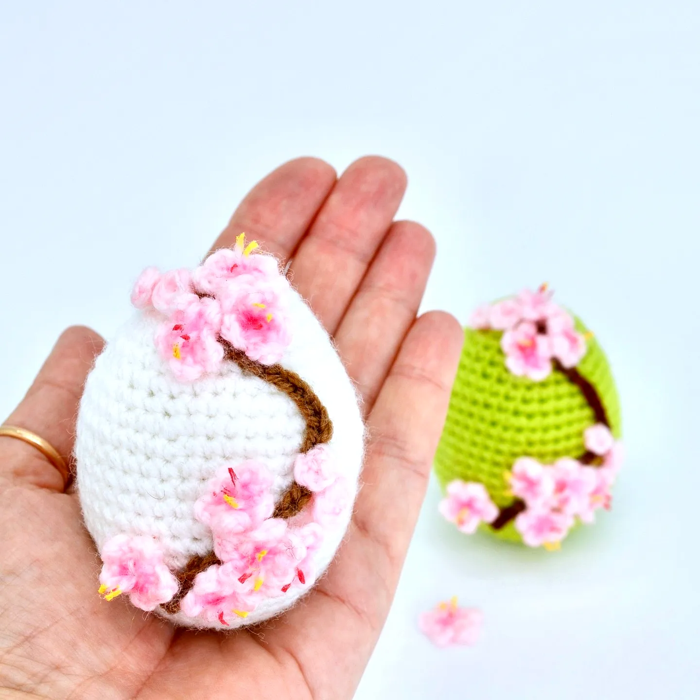 Charming Crochet Easter Egg in Pastel Colors with Cherry Blossoms
