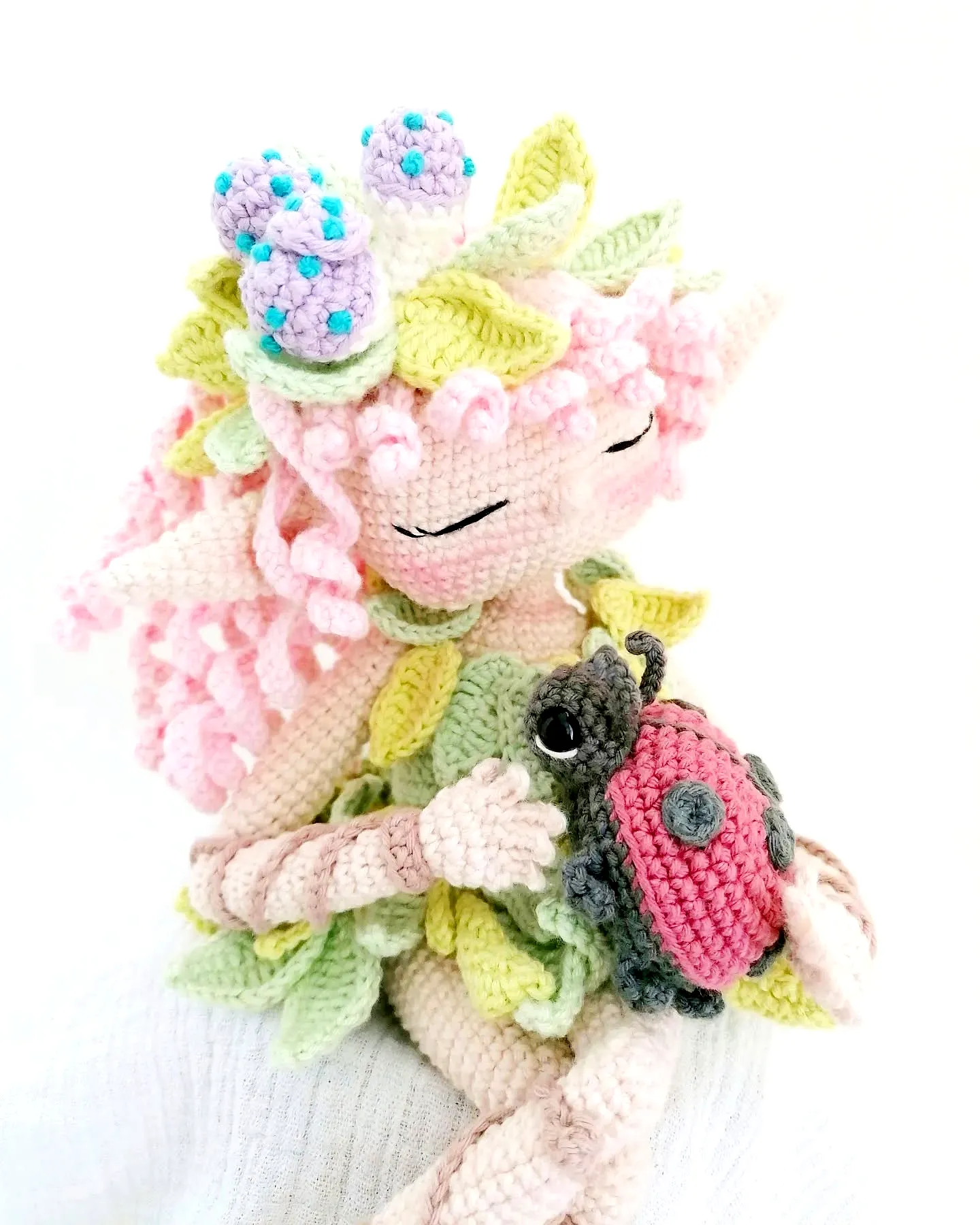 Charming Crochet Elf in Pastel Colors with Floral Accents