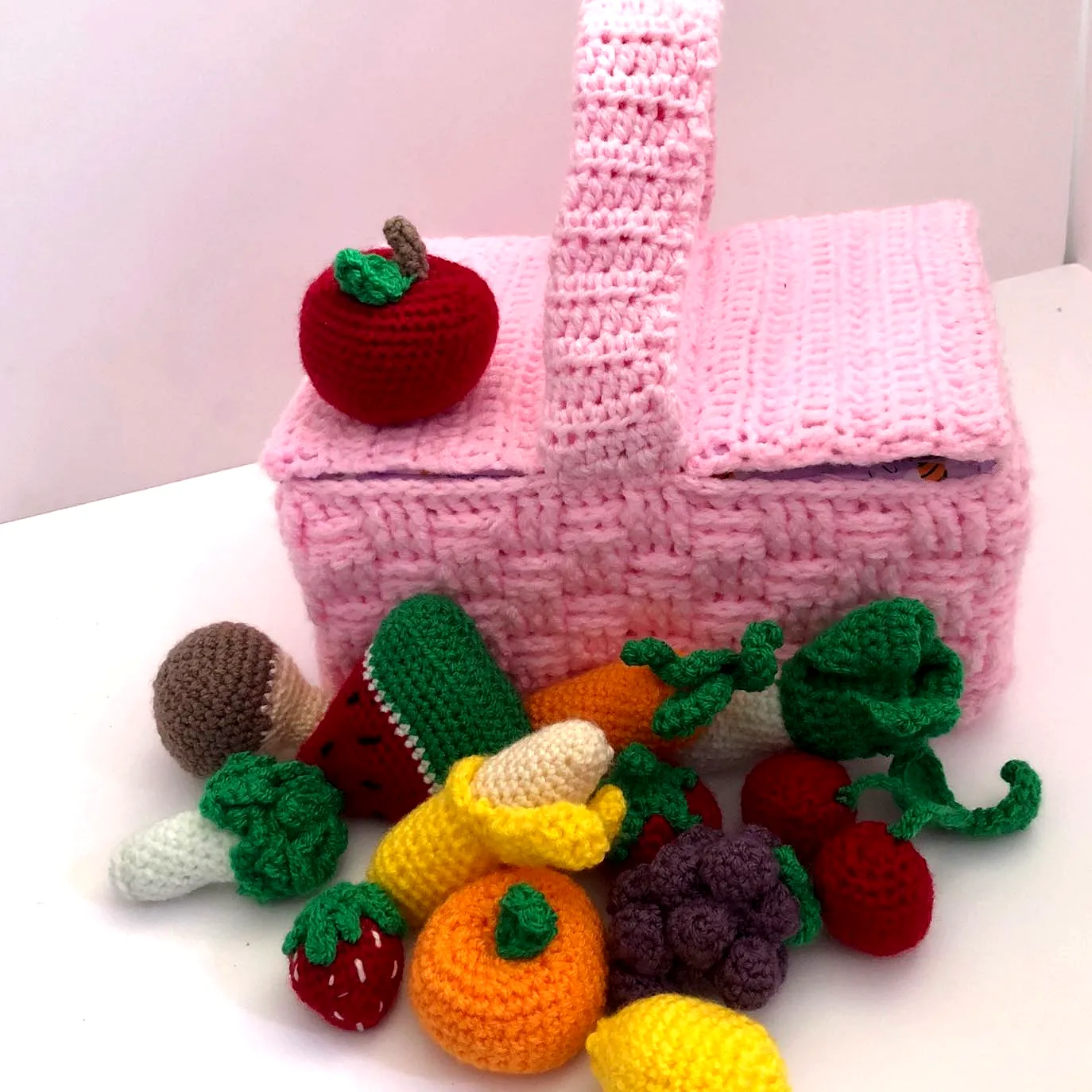 Charming Crochet Fruit Basket in Soft Pink with Vibrant Details