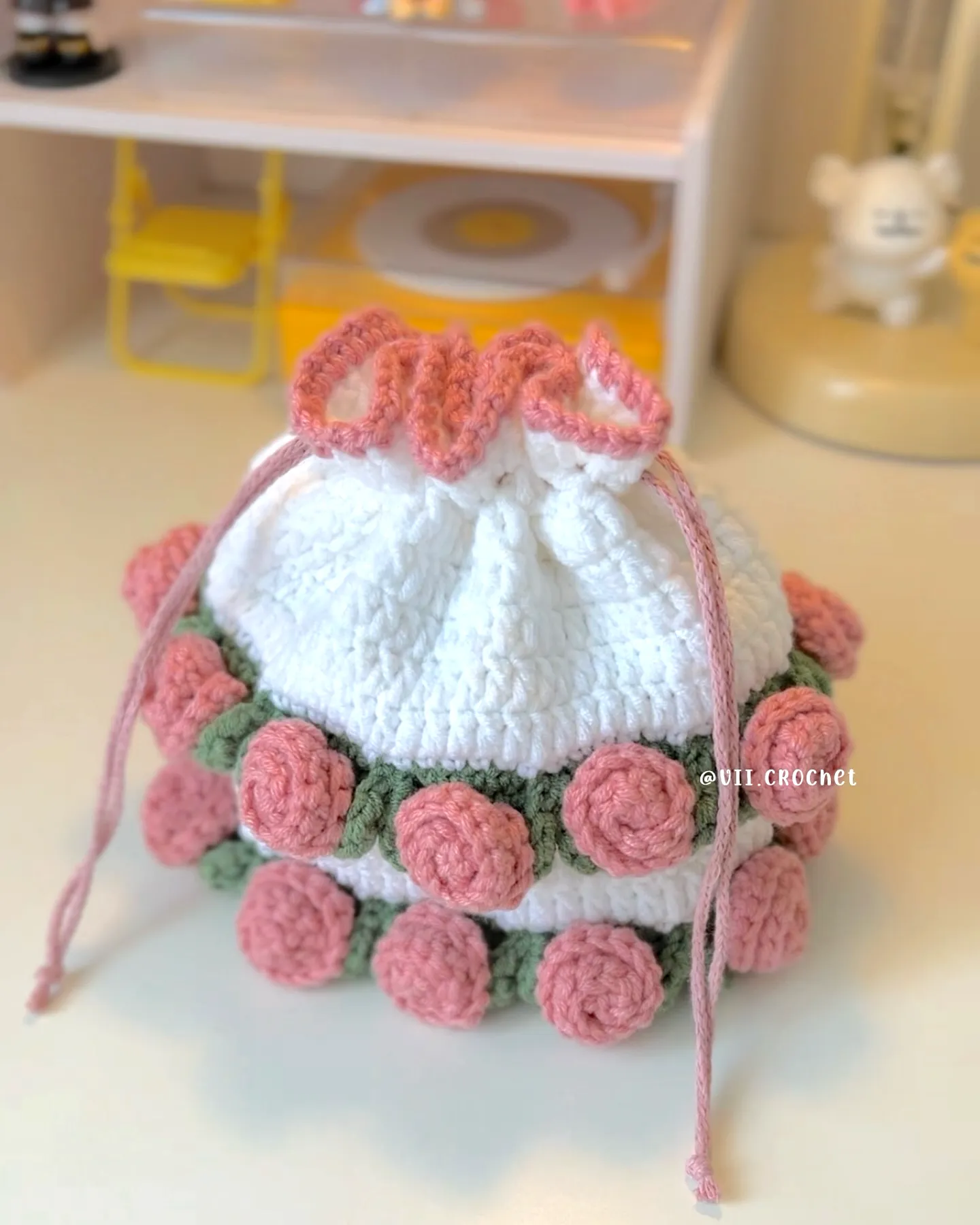 Charming Crochet Gift Bag with Pastel Floral Appliques