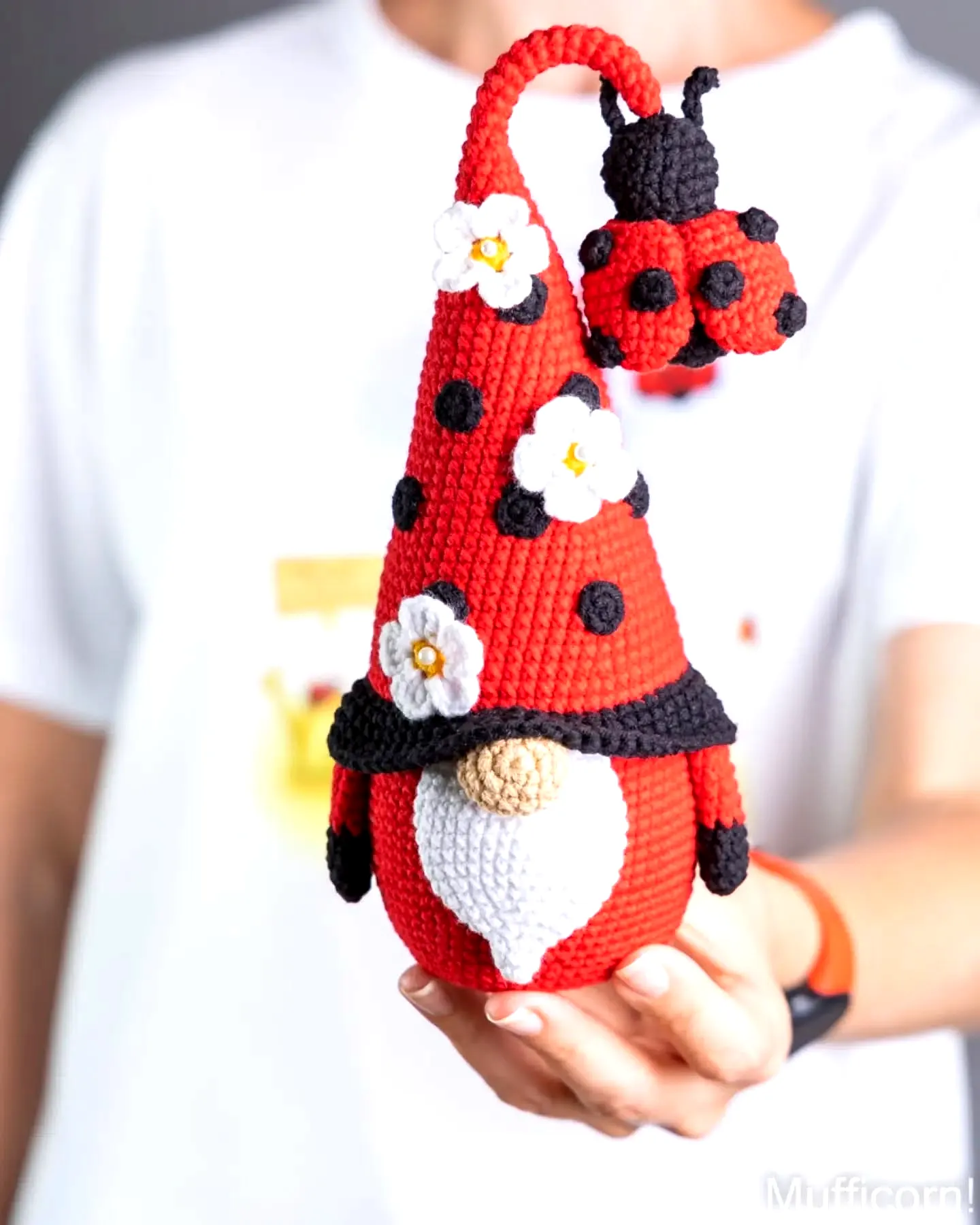 Charming Crochet Gnome in Vibrant Red and Black with Flowers