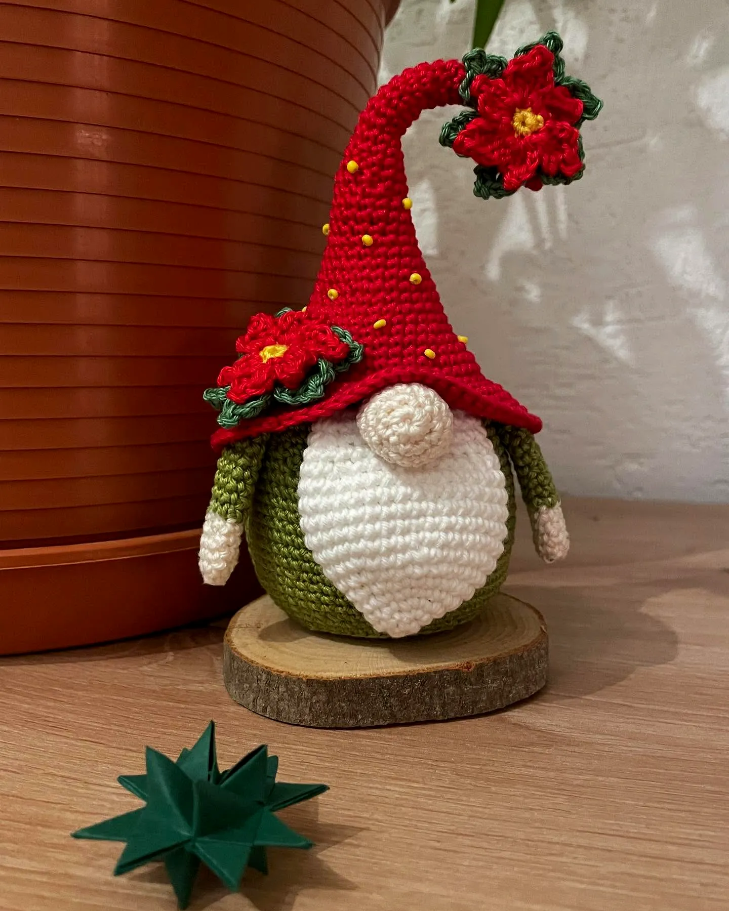Charming Crochet Gnome with Colorful Hat and Floral Accents