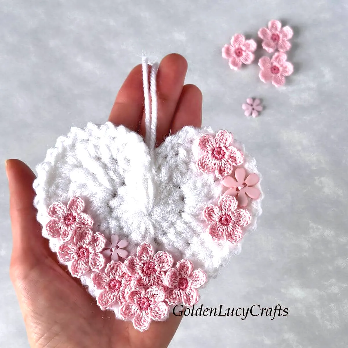 Charming Crochet Heart in White with Pink Floral Accents