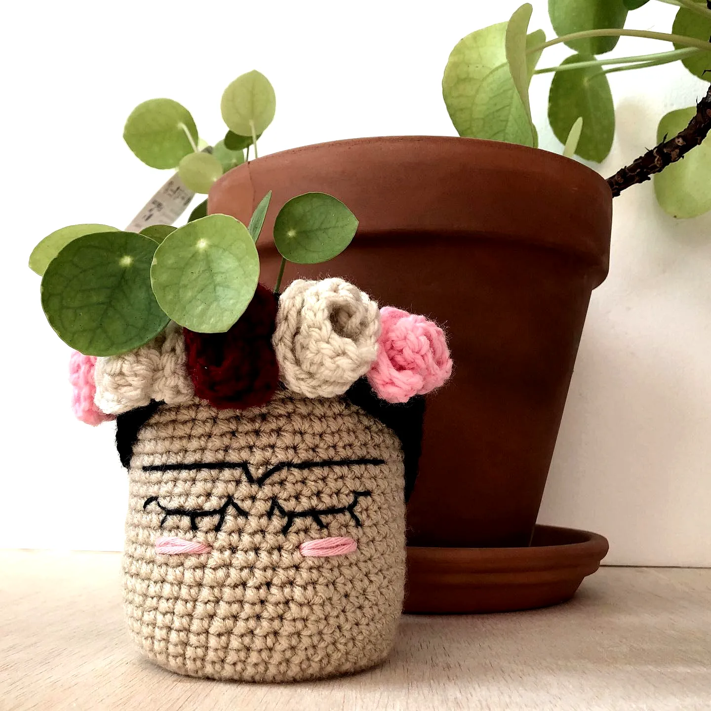 Charming Crochet Jar Cover with Vibrant Floral Face Design