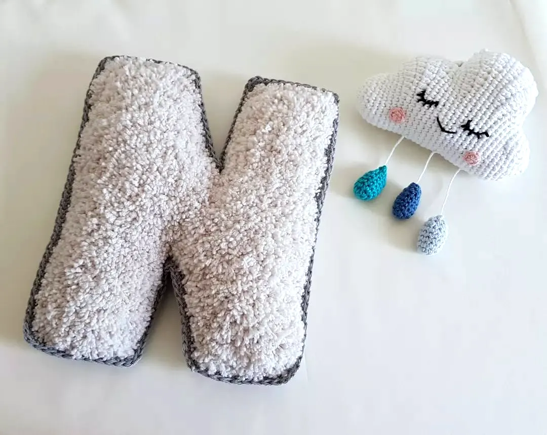 Charming Crochet Nursery Decor in Neutral Gray and White