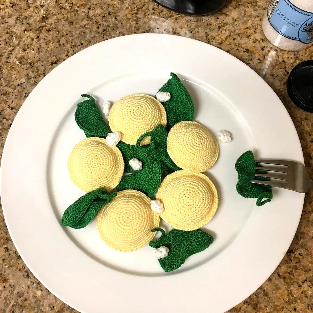 Charming Crochet Pasta Display with Colorful Yarn Creations