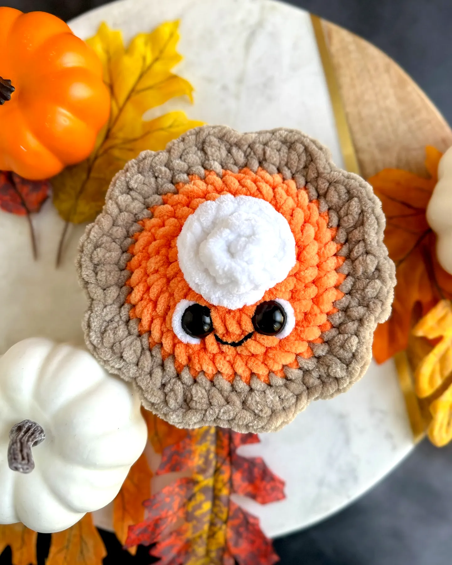 Charming Crochet Pumpkin Pie with Colorful Creamy Topping