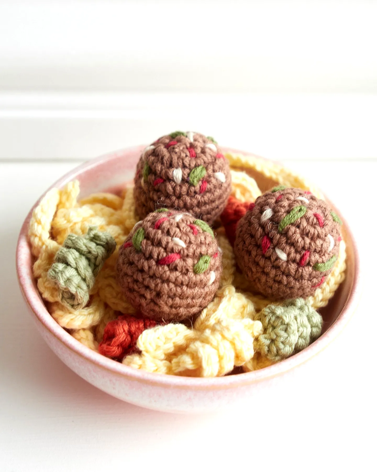 Charming Crochet Spaghetti Art in Vibrant Yarn Colors