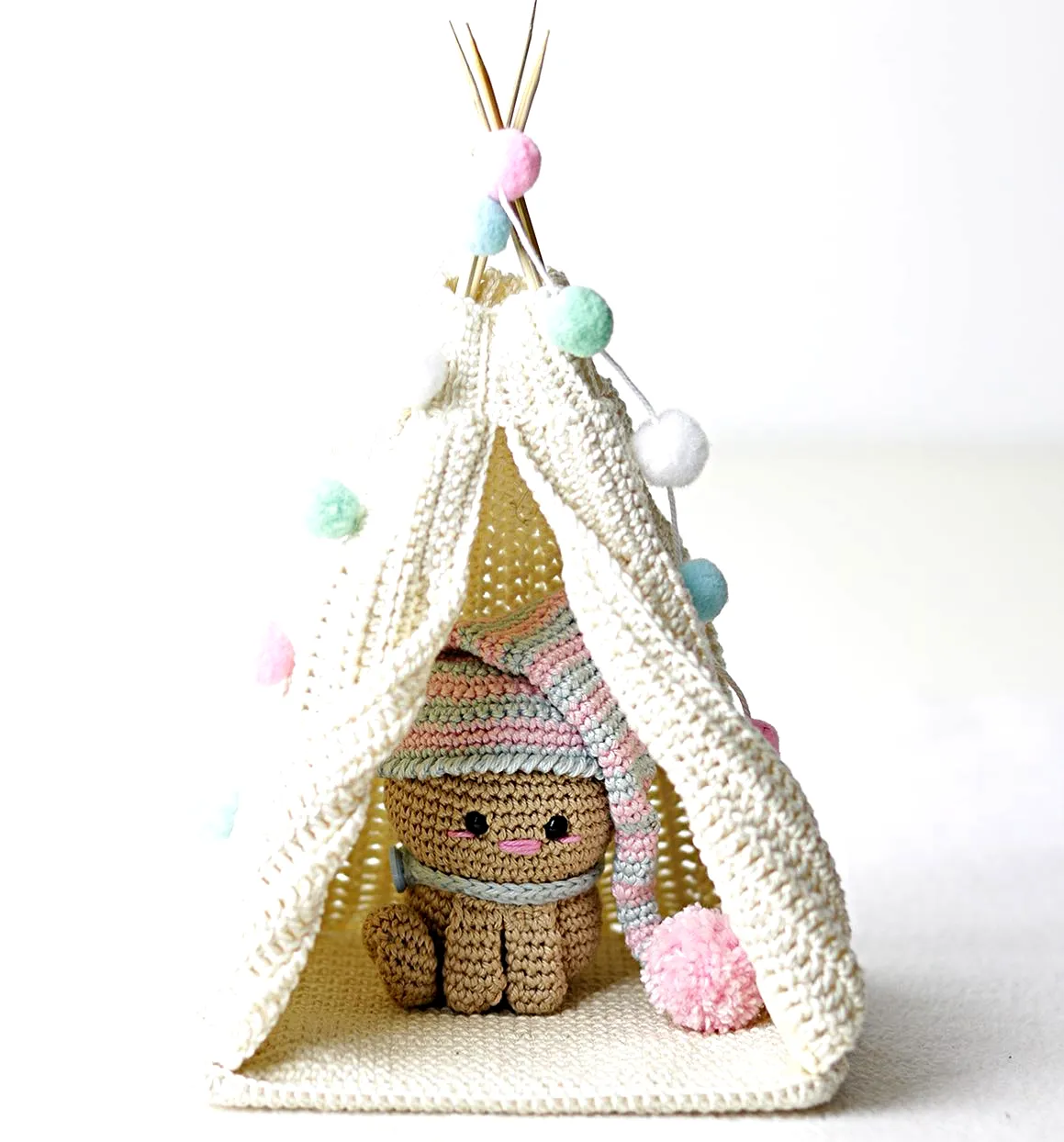 Charming Crochet Tent in Cream with Pastel Pom-Poms for Decor
