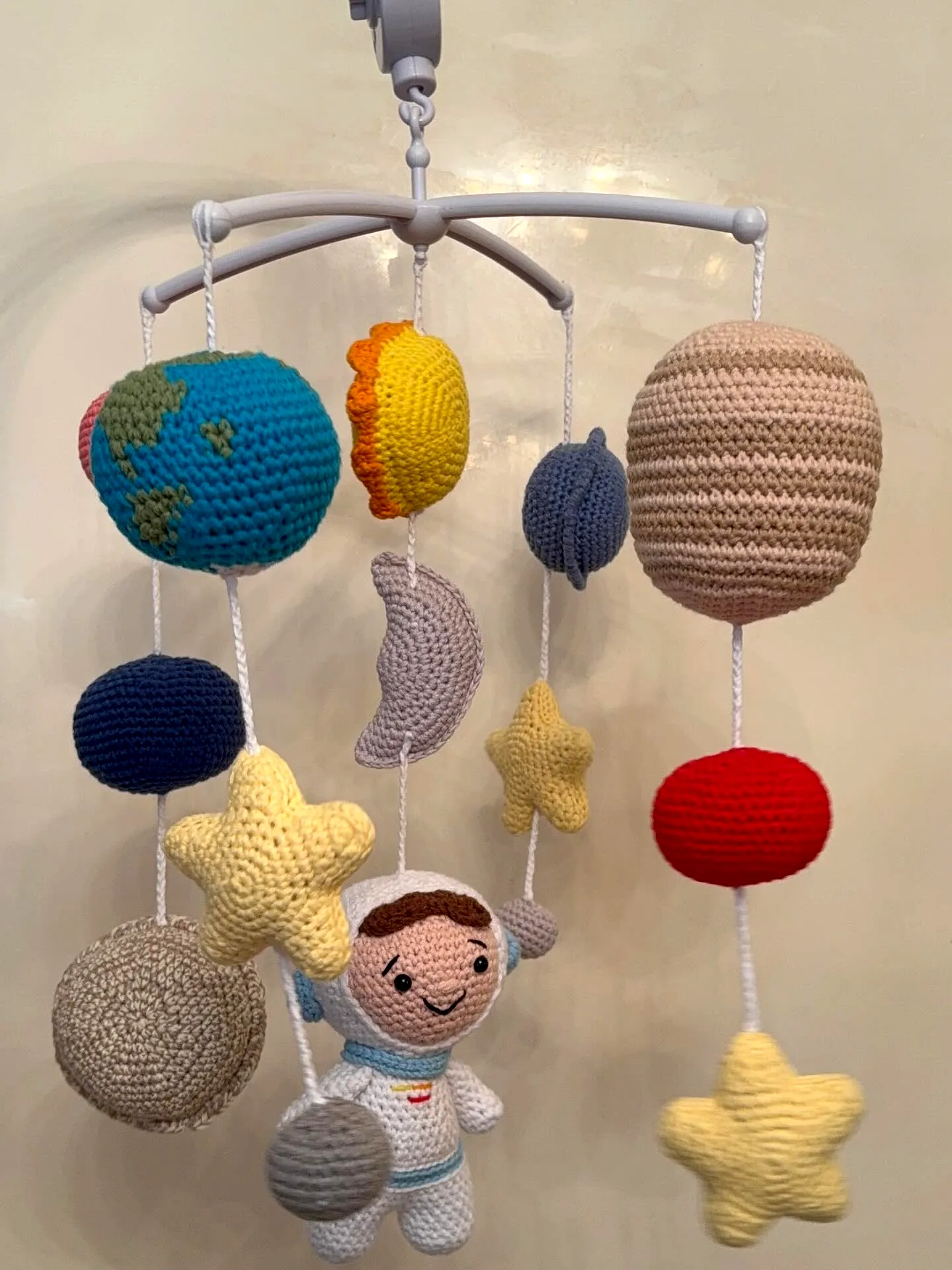 Colorful Crochet Crib Mobile with Vibrant Space Theme