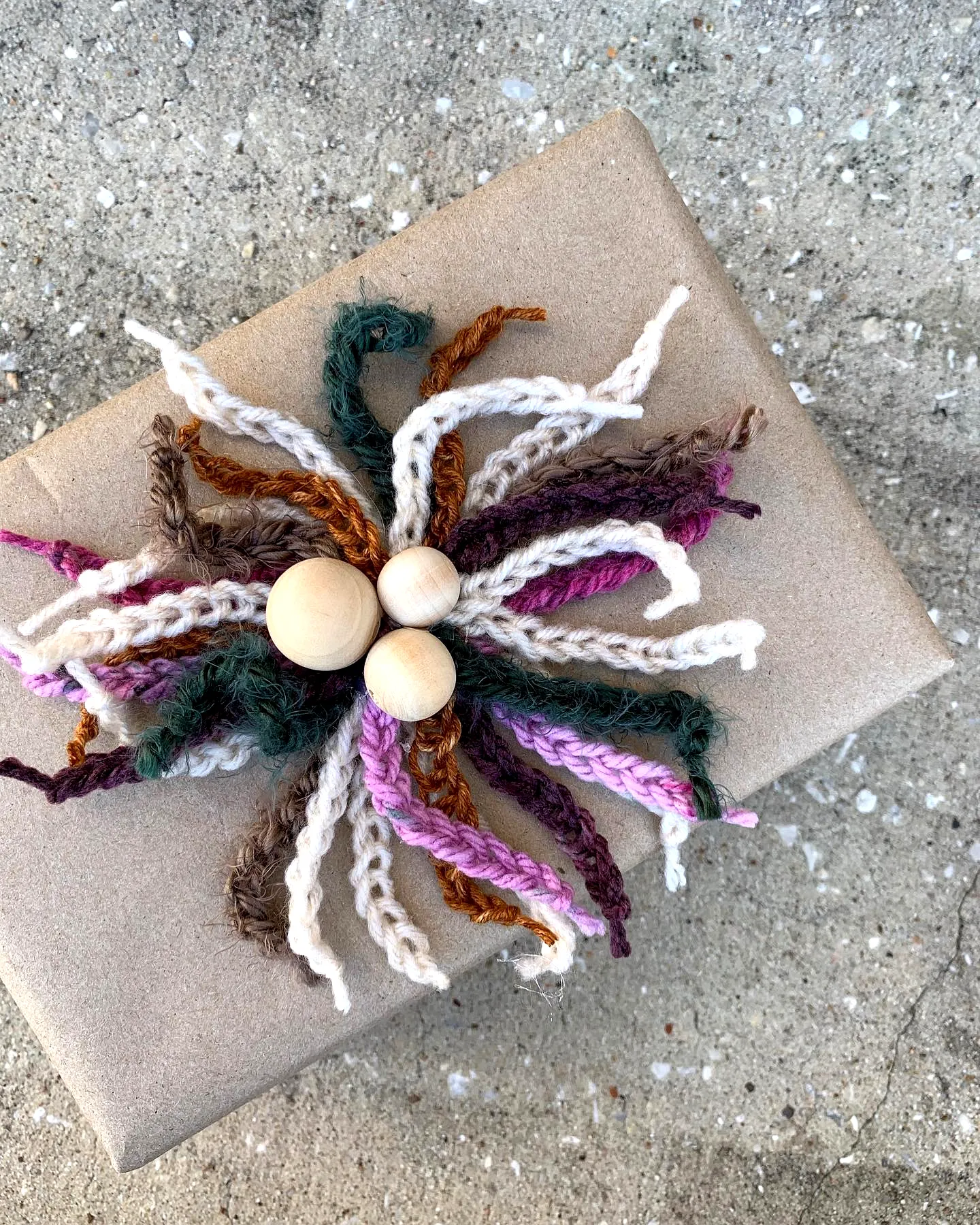Colorful Crochet Gift Wrap with Fringes and Wooden Beads