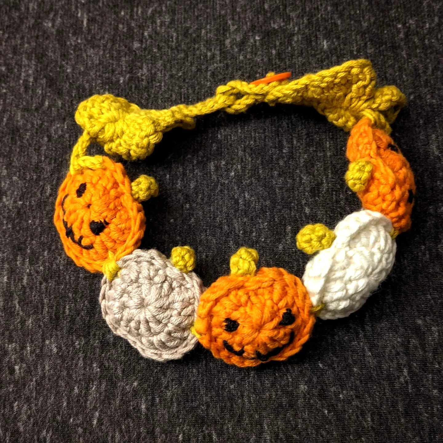 Colorful crochet pet collar with pumpkin motifs for small pets
